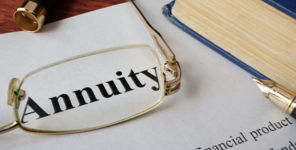 annuity paperwork with glasses